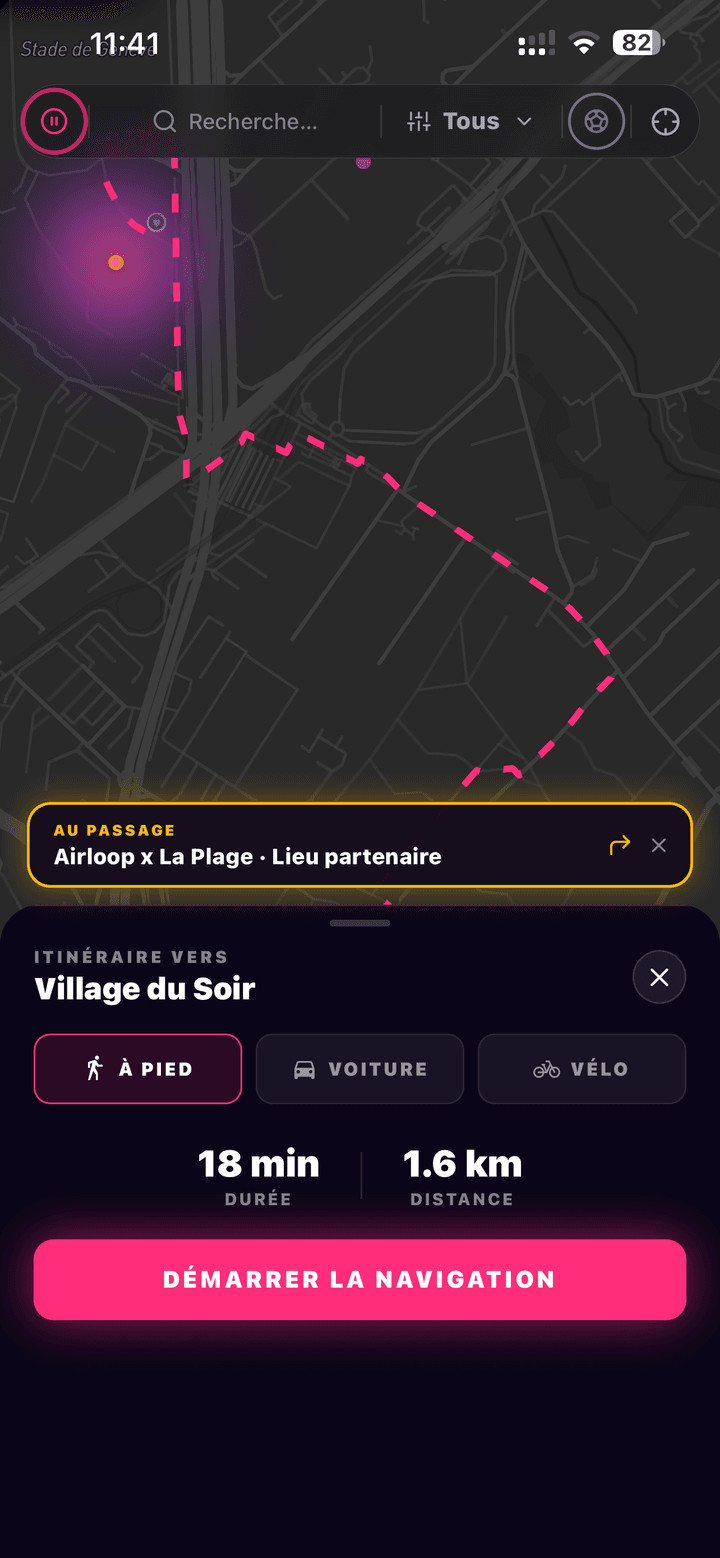 Itinéraire de NoctiPulse : tracé rose en pointillés jusqu'au Village du Soir, choix À pied, Voiture, Vélo, 18 min et 1.6 km, bouton Démarrer la navigation